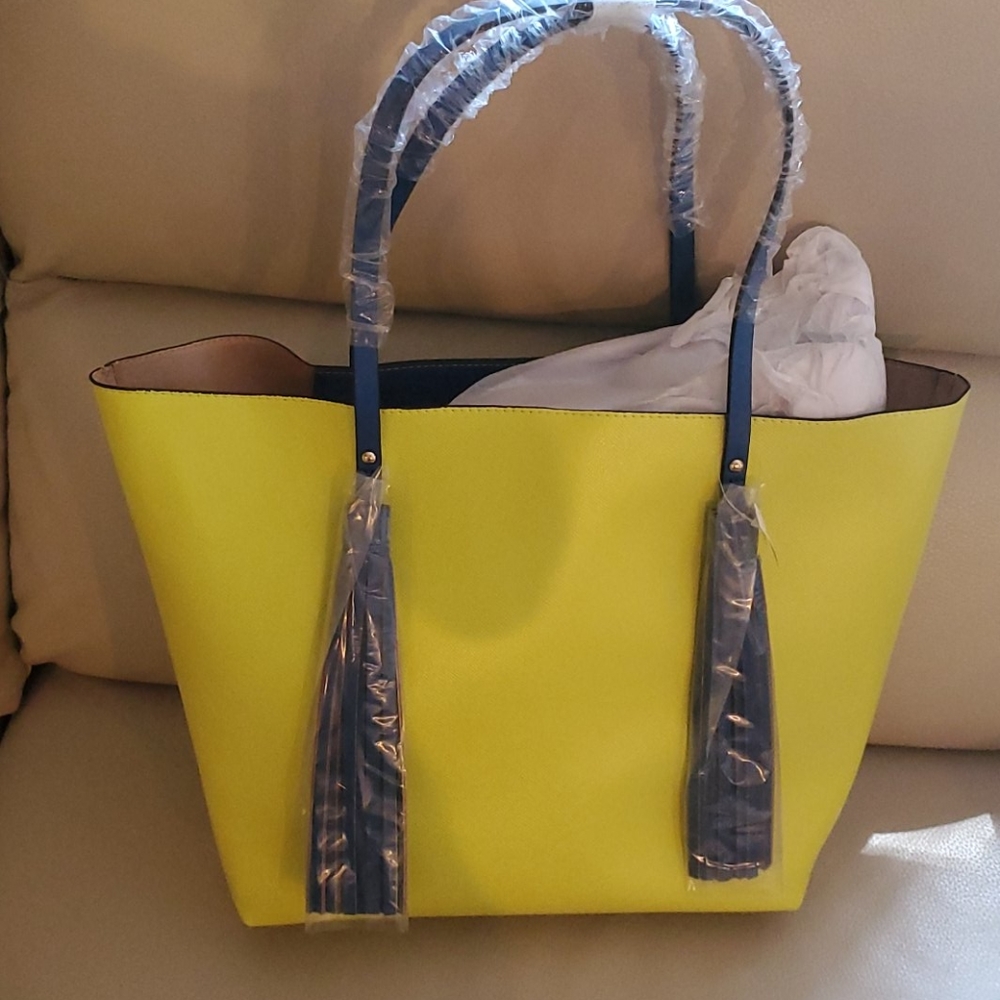 Yellow and blue trim Nieman Marcus tote bag.